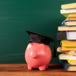 Adobe Stock royalty-free image #175812479, 'Study theme with pink piggy bank with chalkboard' uploaded by fotofabrika, standard license purchased from https://stock.adobe.com/images/download/175812479; file retrieved on October 20th, 2019. License details available at https://stock.adobe.com/license-terms - image is licensed under the Adobe Stock Standard License